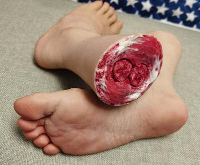 realistic severed male feet